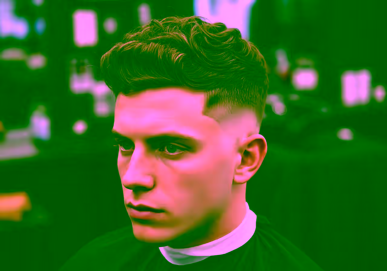 Drop Fade with Thick Curls hairstyle for men 2026 — drop fade variation, best for diamond, heart faces + thick curly hair, modern barbering by Master Stylist Jessica Hamilton