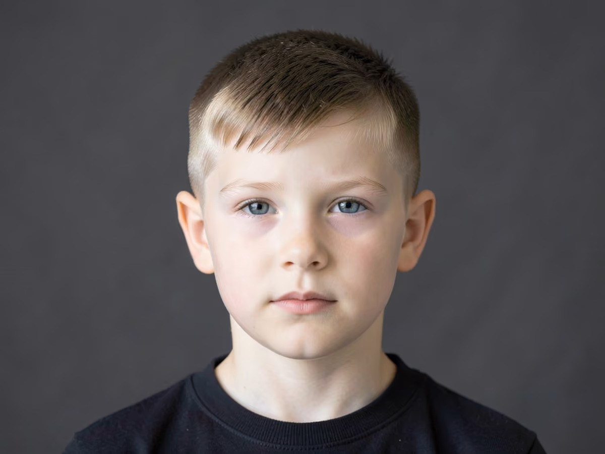 Boy with an e-boy low taper haircut
