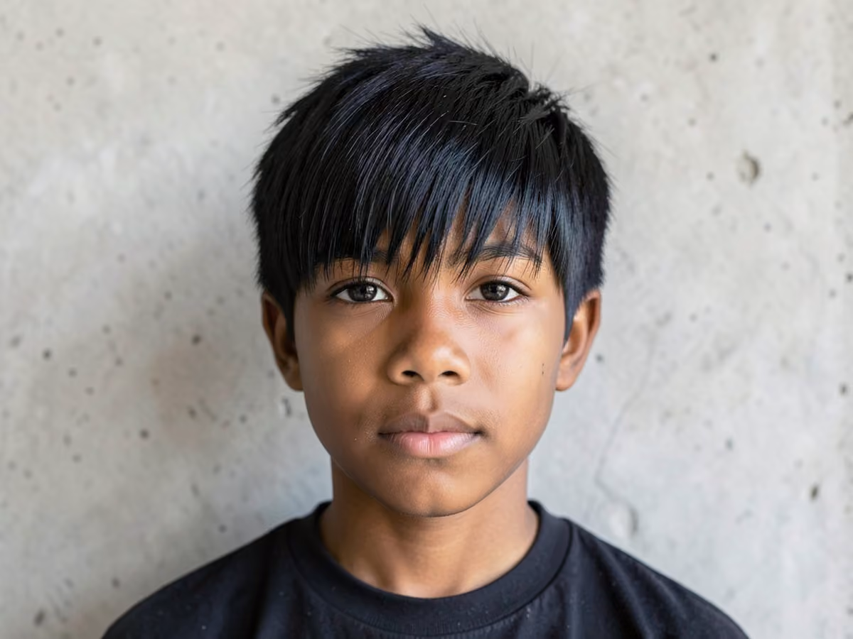 Boy with a jet black e-boy hair