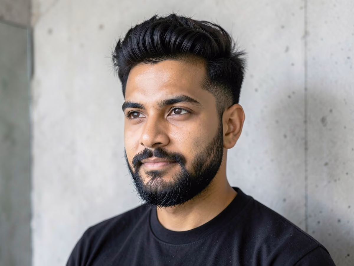 Man with a fluffy hair with beard