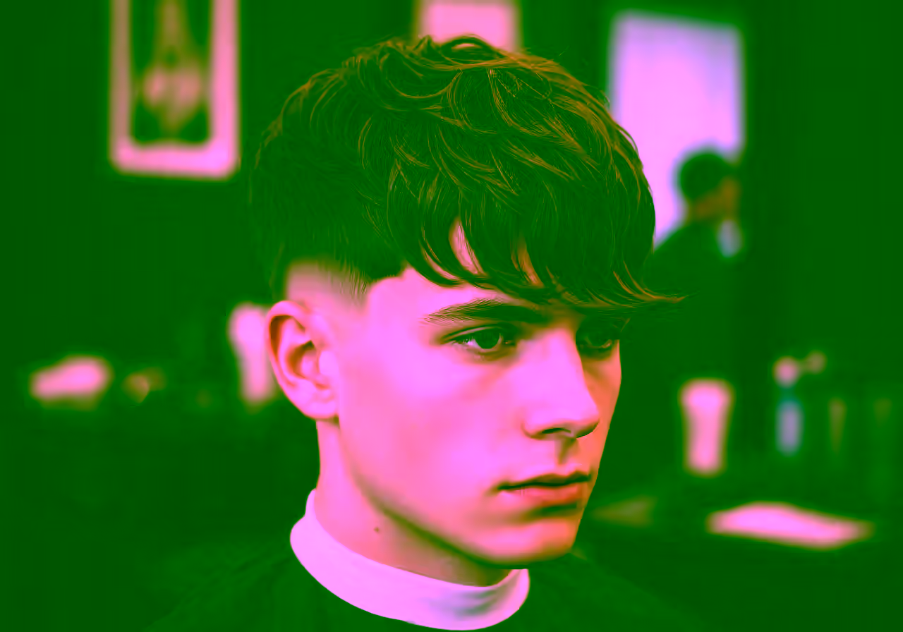 French Crop Long Fringe hairstyle for men 2026 — french crop variation, best for oval, heart faces + wavy hair, modern barbering by Master Stylist Jessica Hamilton