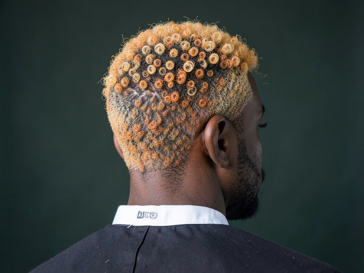 Man with a frosted tips for black men haircut