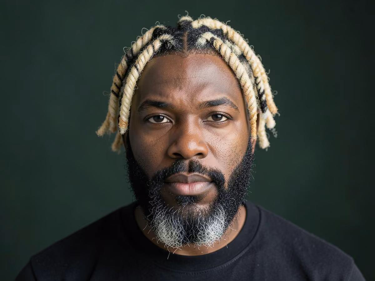 Man with a frosted twists haircut