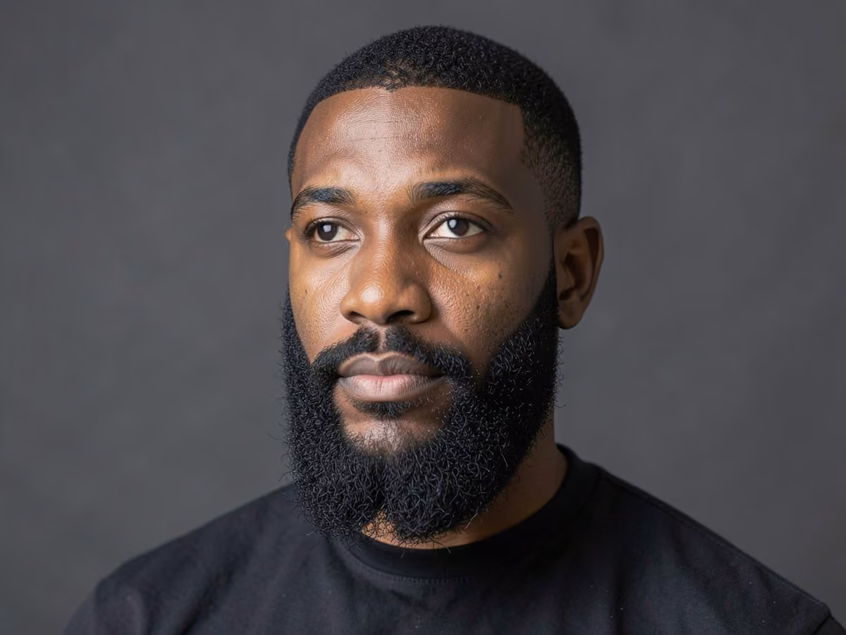 Man with a full beard for long face haircut