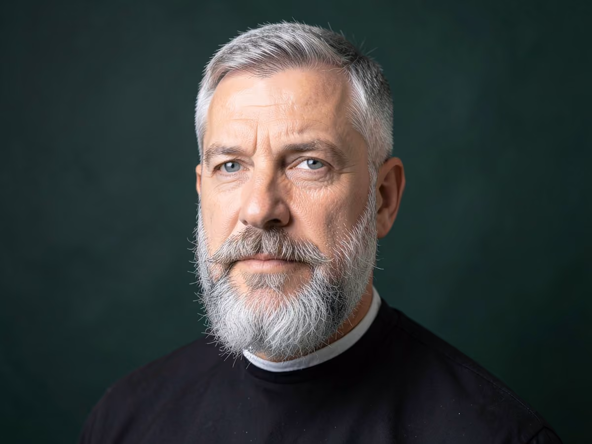 Man with a gray full beard haircut