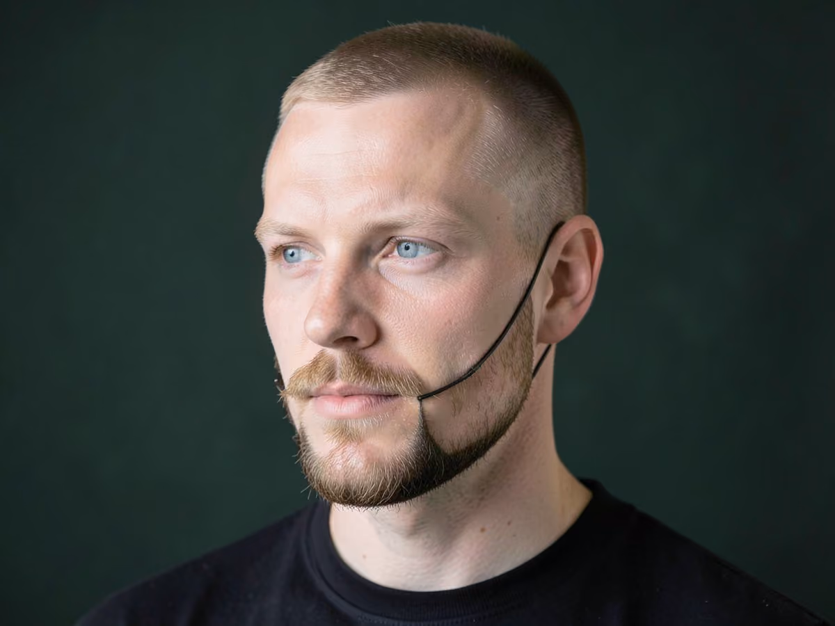 Man with a chin strap goatee haircut