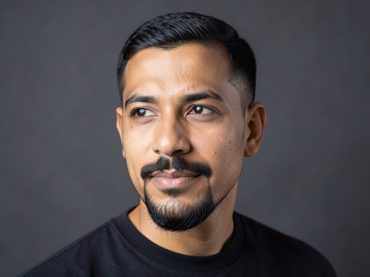 Man with a full goatee haircut