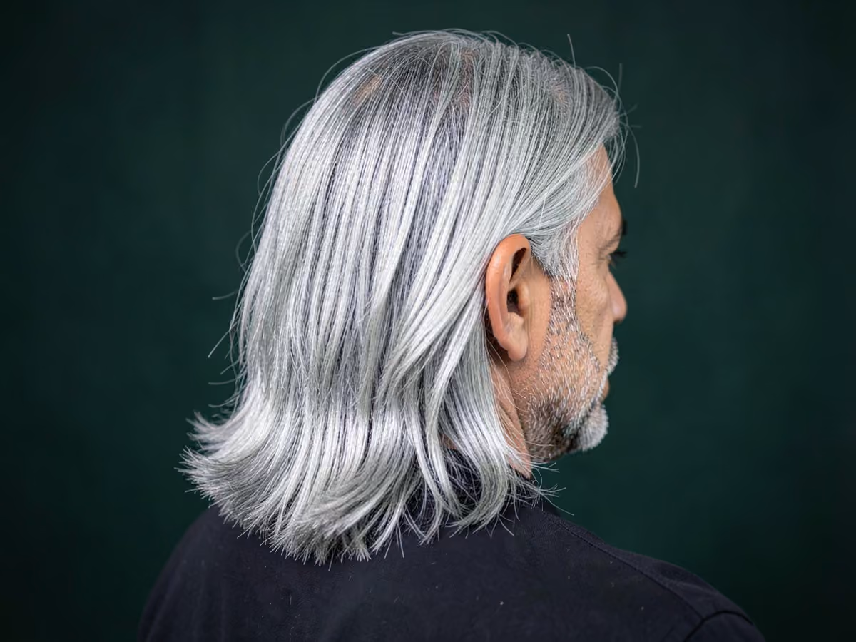 Man with a long silver hair