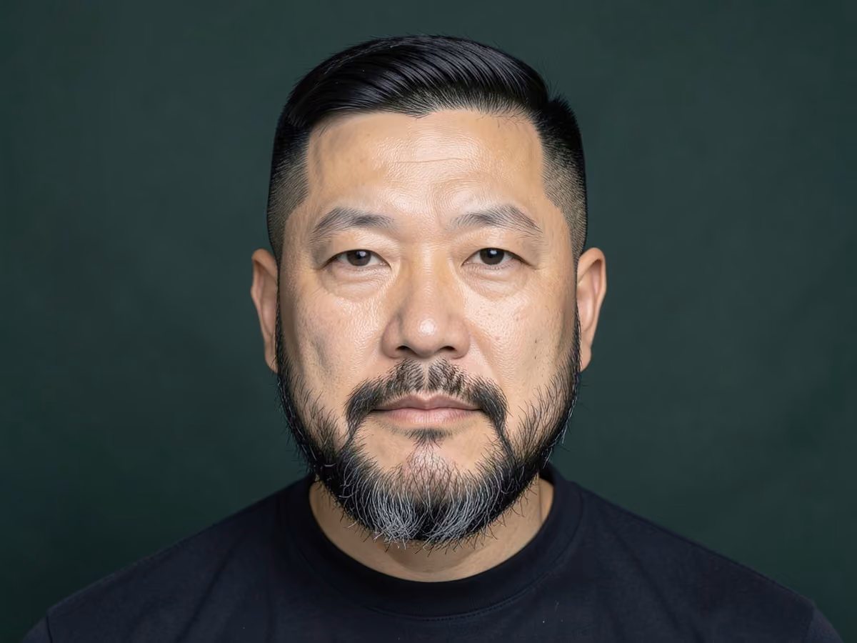 Man with a harvard clip taper haircut