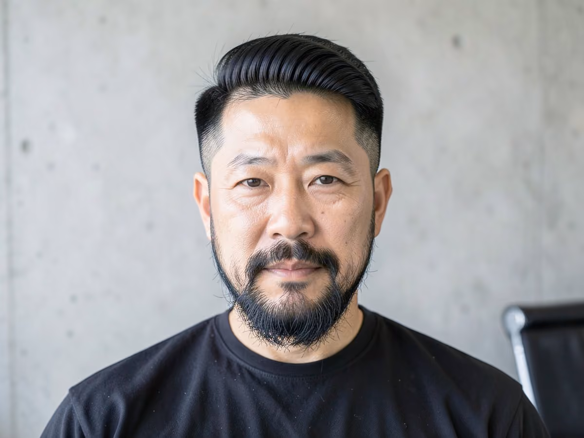 Man with a thick hair scissor cut
