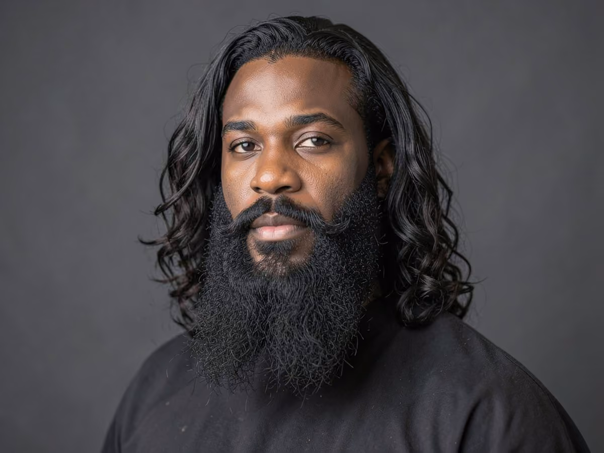 Man with a long waves with bandholz beard haircut