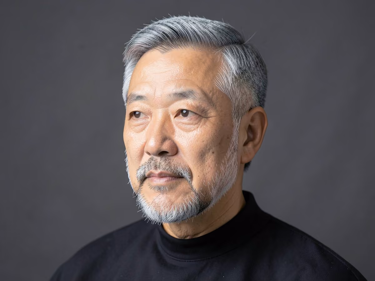Man with an oval face haircut with beard
