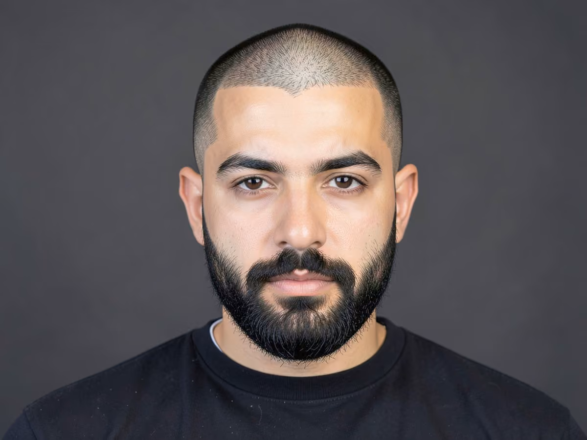 Man with a high bald fade