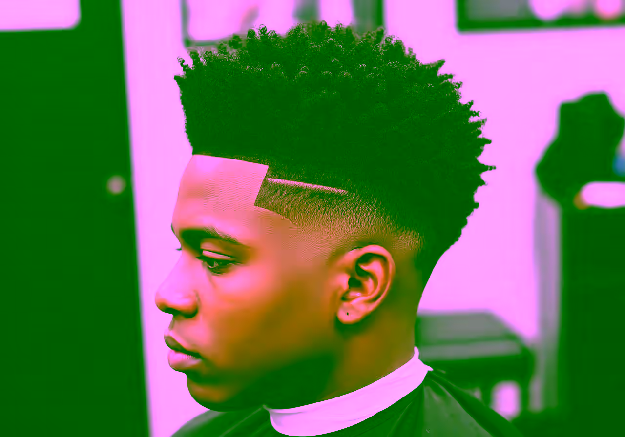 High Taper Fade Curly Hair hairstyle for men 2026 — high taper fade variation, best for oval, diamond, heart faces + curly/coily hair, modern barbering by Master Stylist Jessica Hamilton