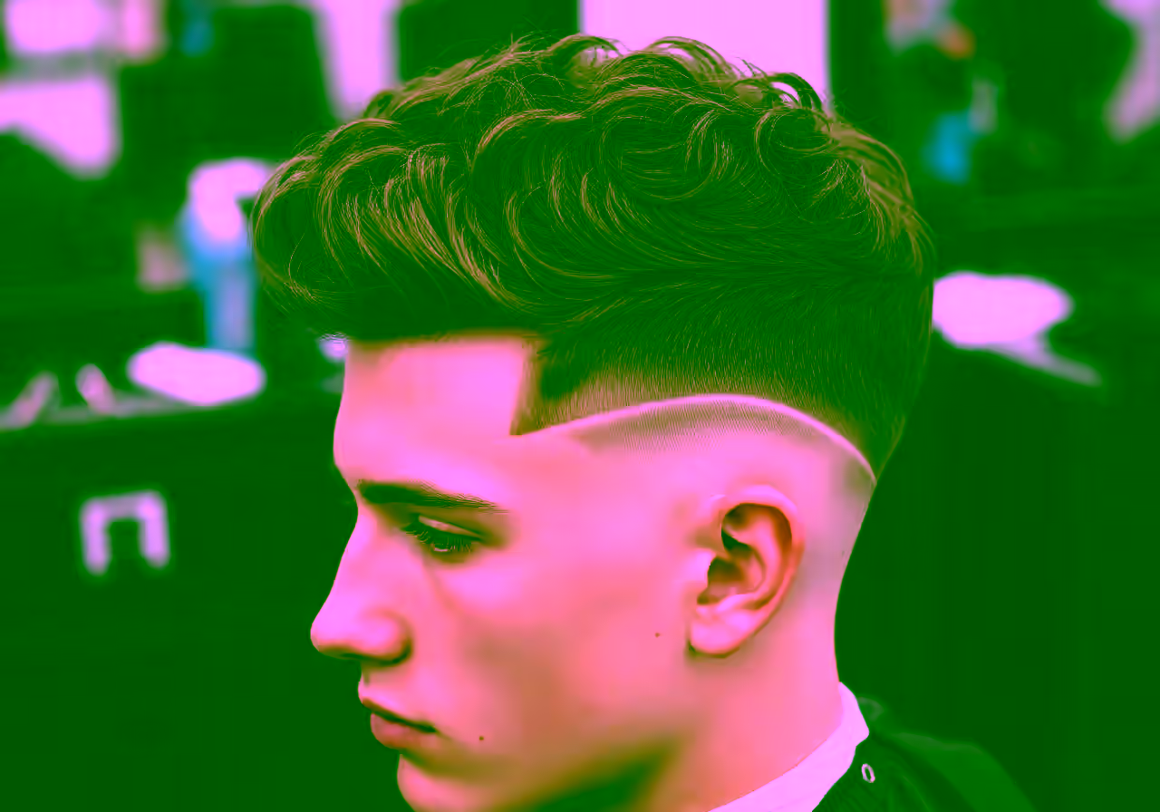 High Taper Fade Curly Top hairstyle for men 2026 — high taper fade variation, best for teens, oval faces + curly hair, modern barbering by Master Stylist Jessica Hamilton