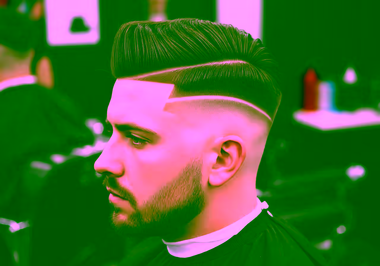 High Taper Fade Hard Part hairstyle for men 2026 — high taper fade variation, best for professional-bold looks + straight hair, modern barbering by Master Stylist Jessica Hamilton