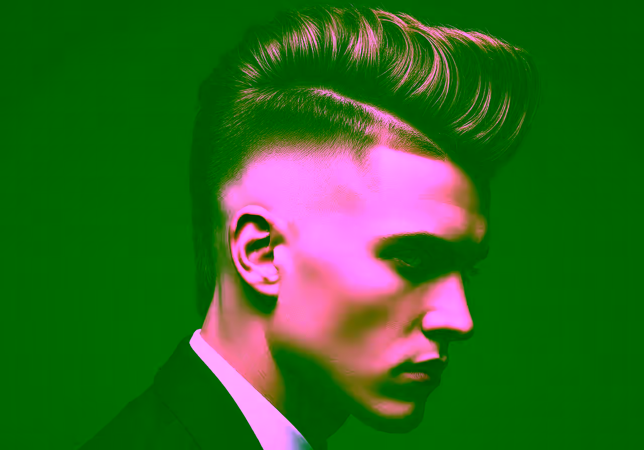 High Taper Fade Mohawk hairstyle for men 2026 — high taper fade variation, best for oval, round faces + thick hair, modern barbering by Master Stylist Jessica Hamilton