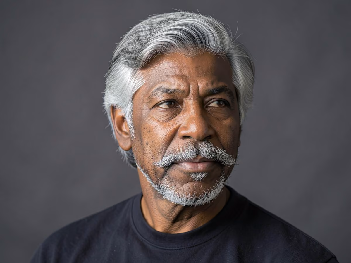 Man with a layered hair with beardstache