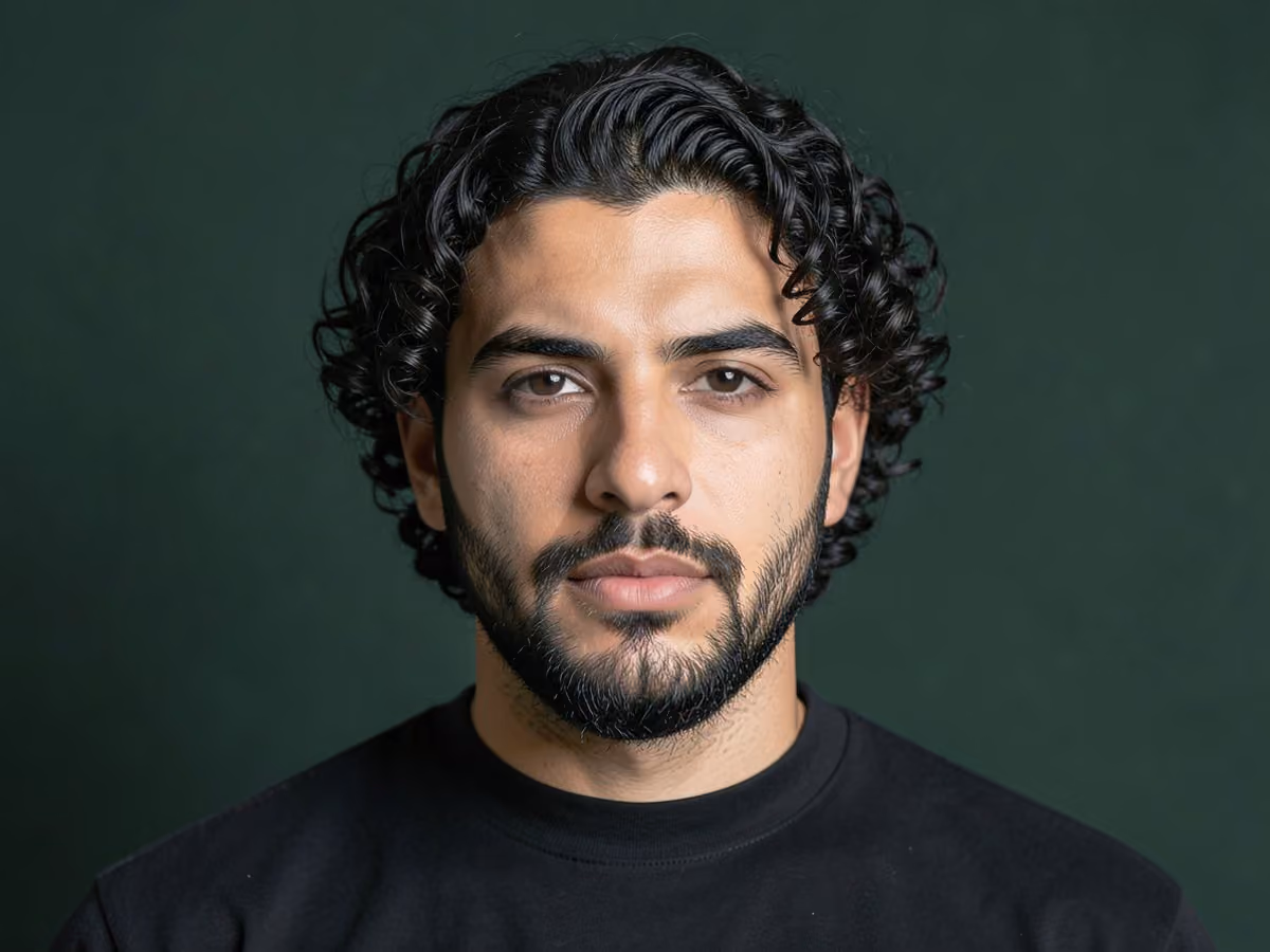 Man with a long tight curls haircut