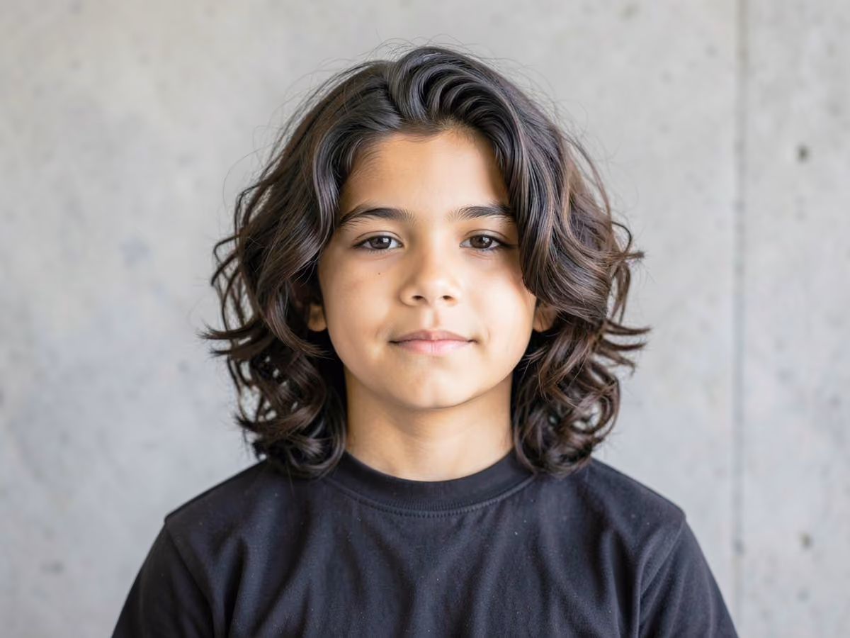 Boy with a boys long wavy hair