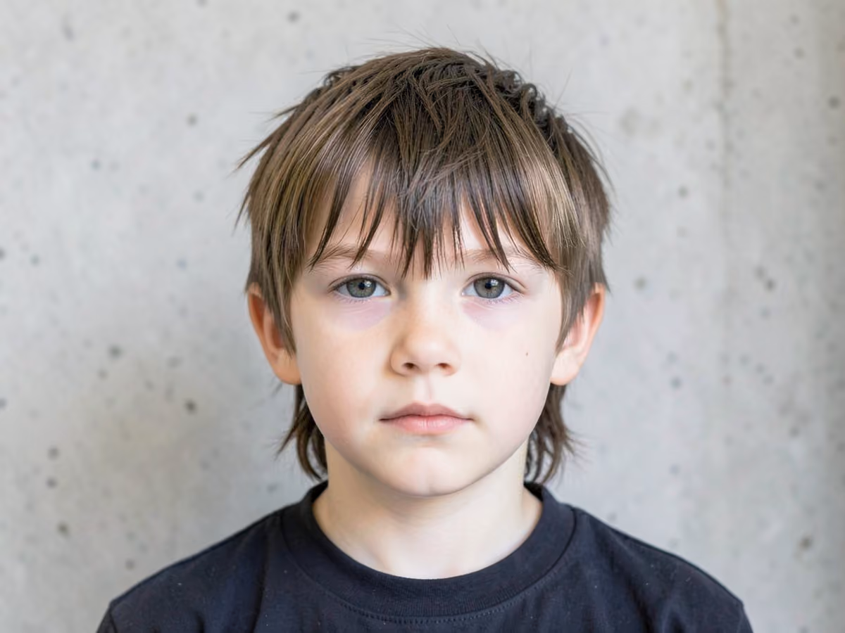 Boy with a boys wolf cut