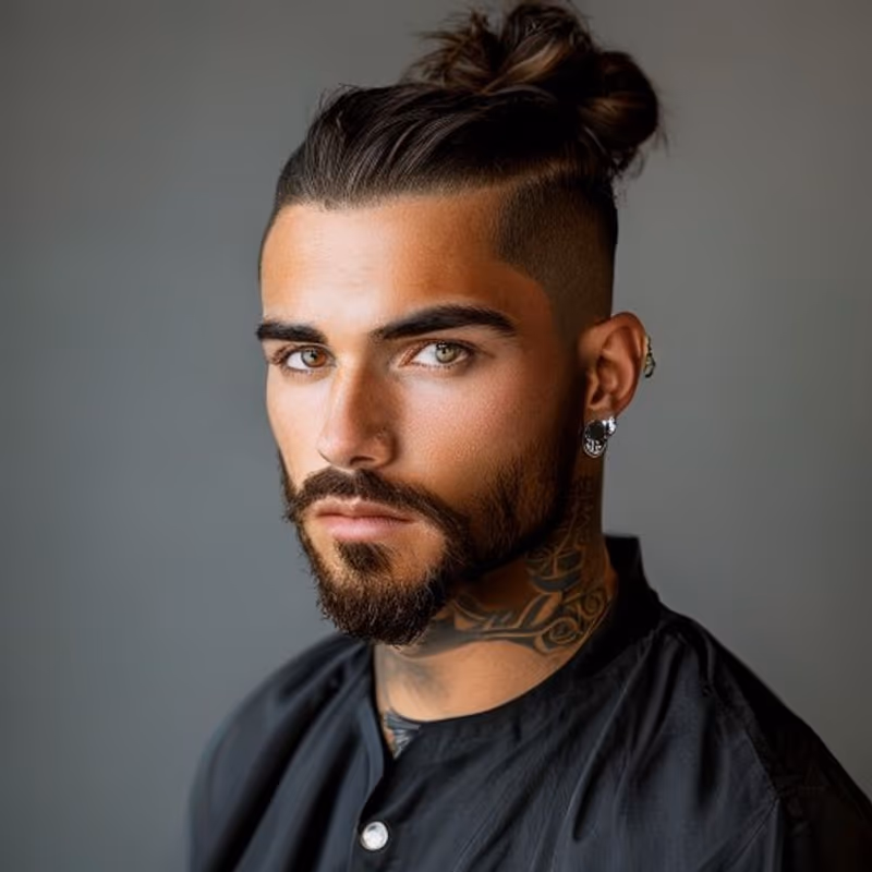 Man Bun Undercut hairstyle for men 2026 — Man Bun variation, best for Bold, edgy, high-contrast, modern barbering by Master Stylist Jessica Hamilton