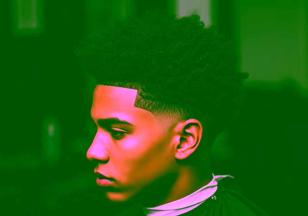 Layered Mid-Length Afro hairstyle for men 2026 — medium length hairstyles variation, best for round/oval faces + coily/curly hair, modern barbering by Master Stylist Jessica Hamilton