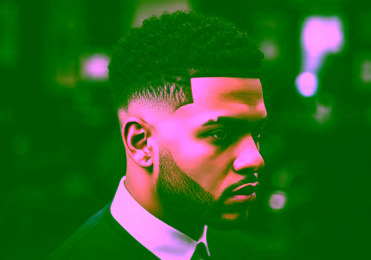 Sponge Twist Mid Taper hairstyle for men 2026 — medium taper fade variation, best for all faces + coily/curly hair, modern barbering by Master Stylist Jessica Hamilton