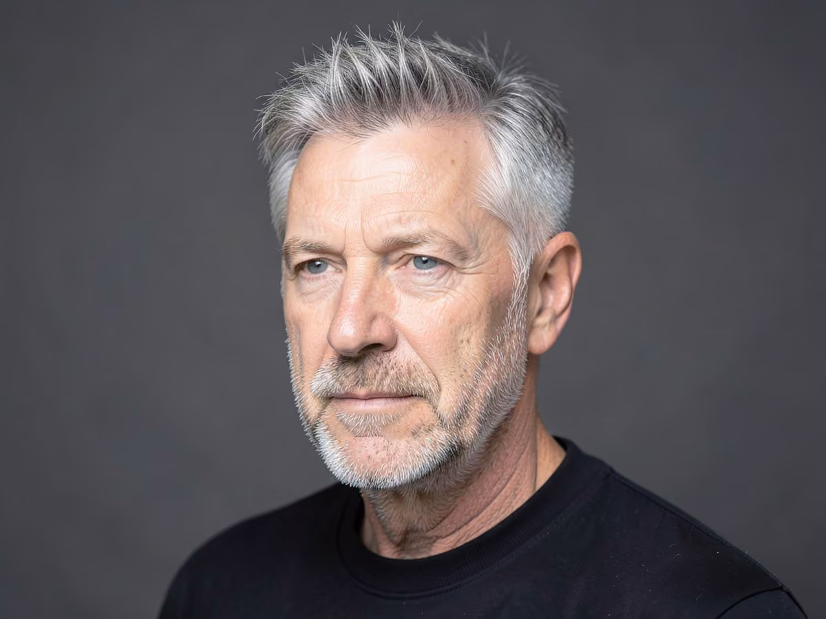 Man with a messy hair with stubble
