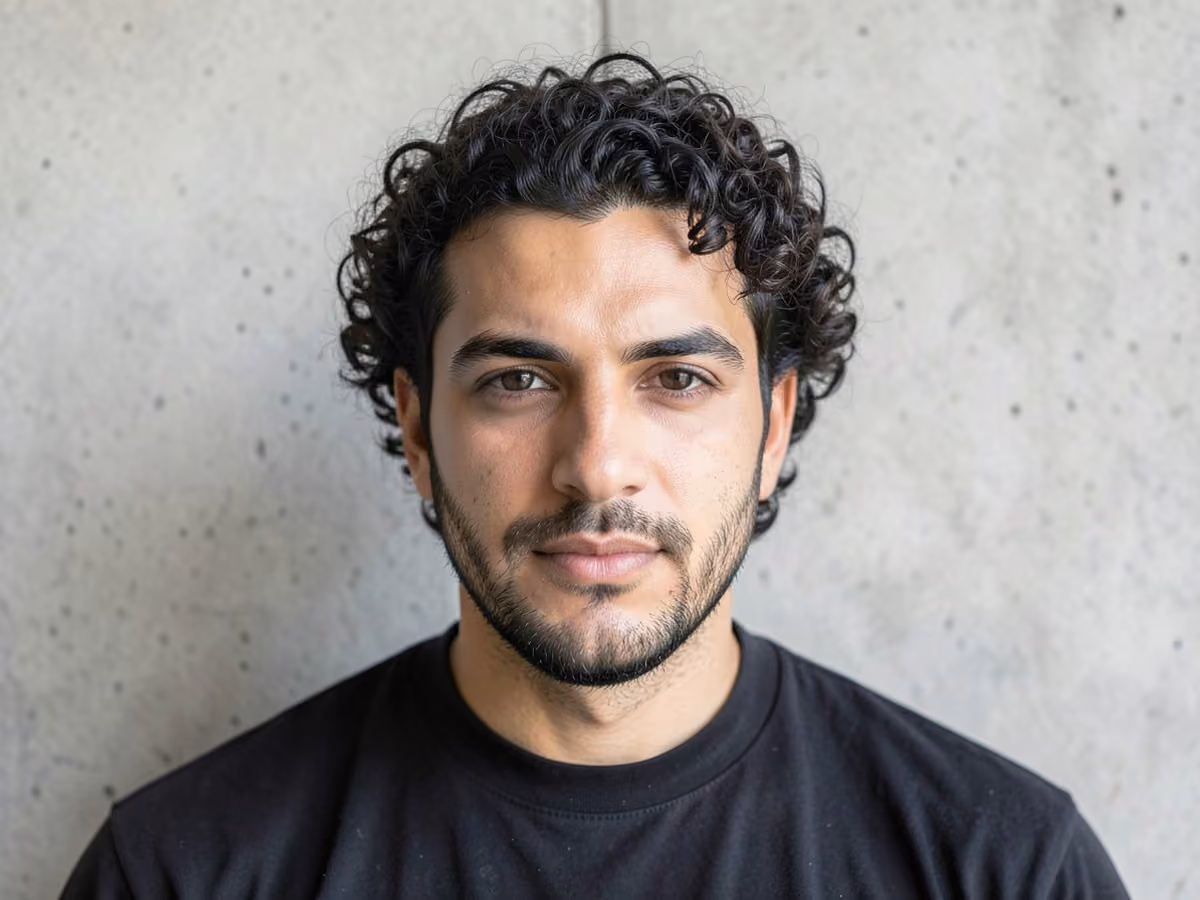 Man with a regulation cut for curly hair
