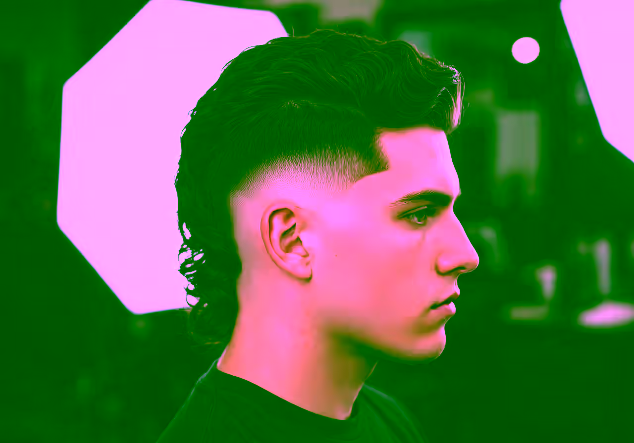 Mullet Drop Fade hairstyle for men 2026 — modern mullet variation, best for all faces + wavy/curly hair, modern barbering by Master Stylist Jessica Hamilton