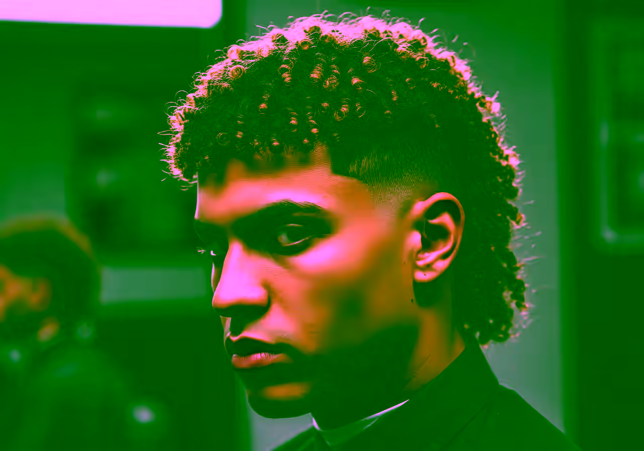 Mullet Sponge Twists hairstyle for men 2026 — modern mullet variation, best for all faces + coily/curly hair, modern barbering by Master Stylist Jessica Hamilton