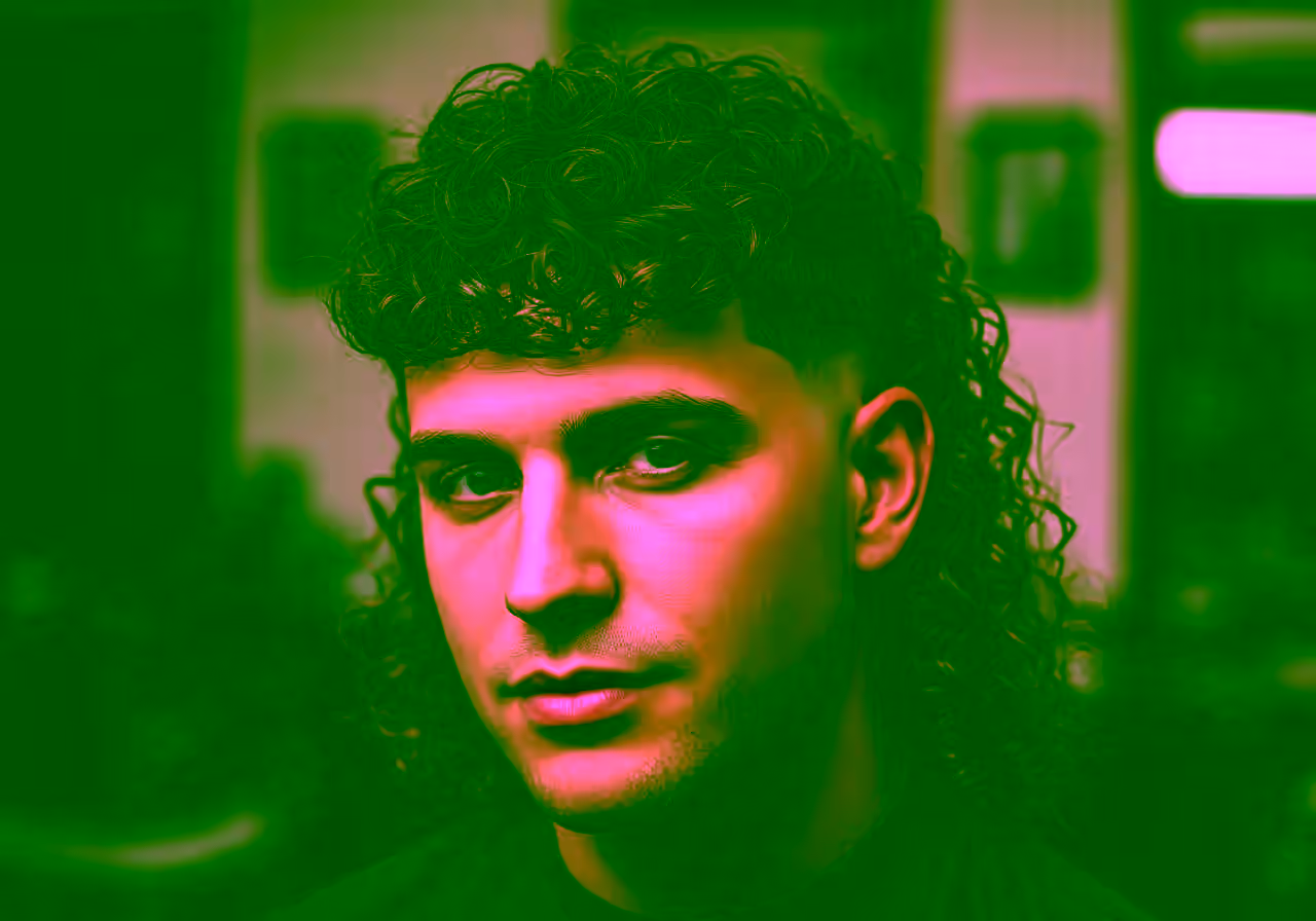 Mullet with Thick Curls hairstyle for men 2026 — modern mullet variation, best for diamond, heart faces + thick curly hair, modern barbering by Master Stylist Jessica Hamilton