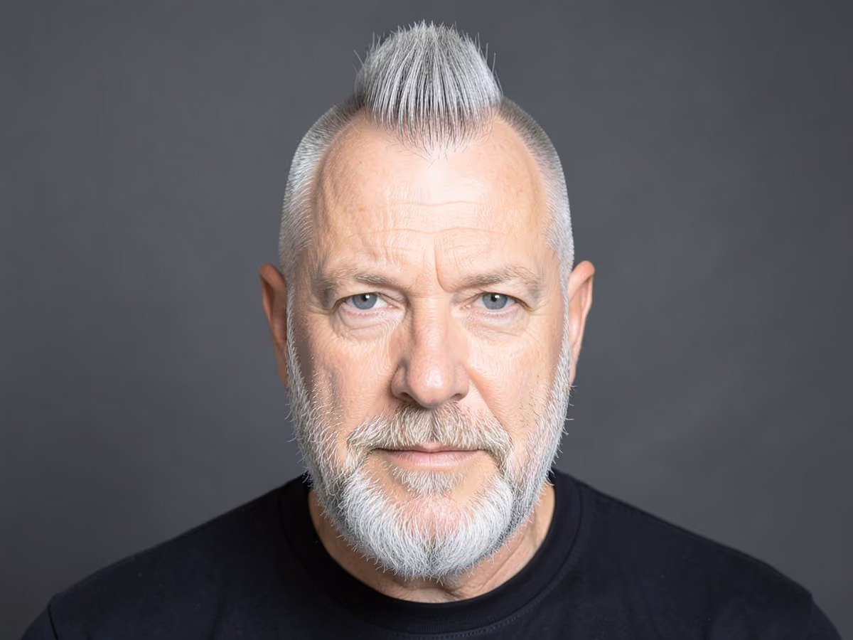 Man with a temple fade mohawk