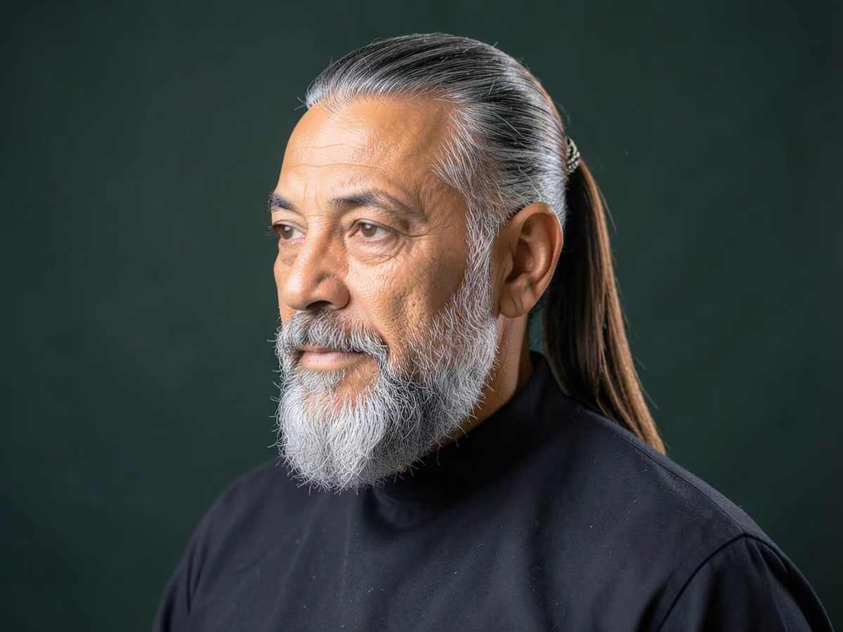 Man with a straight hair ponytail