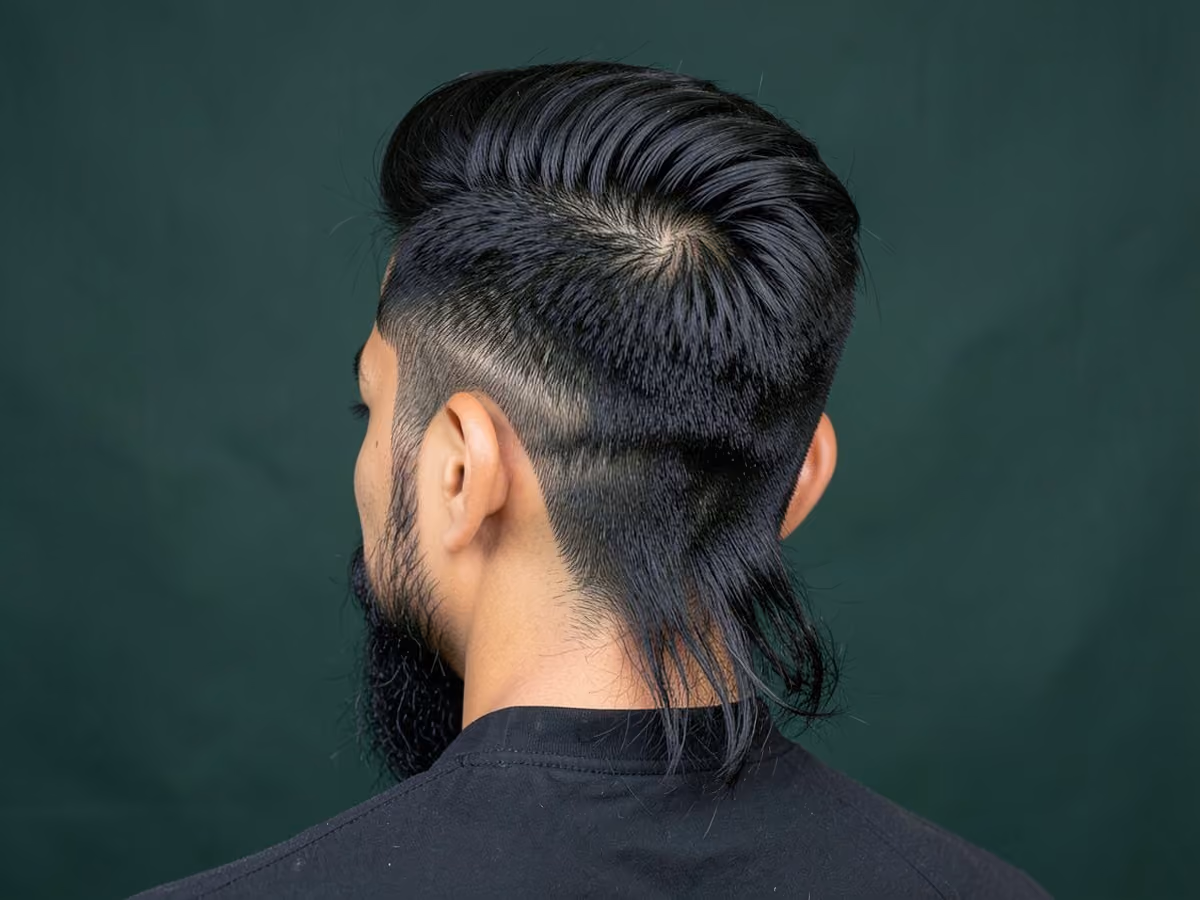 Man with a prom brushed back hair