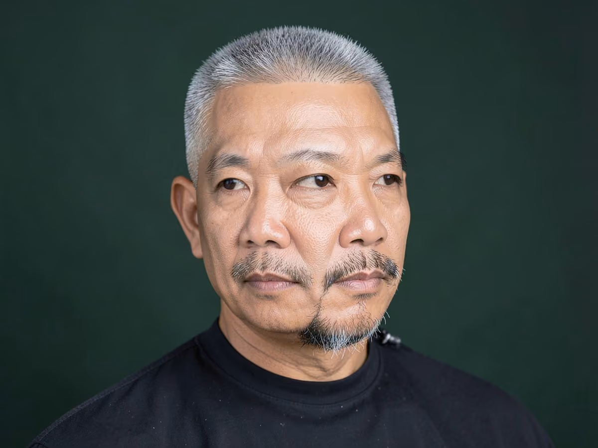 Man with a razor fade with goatee