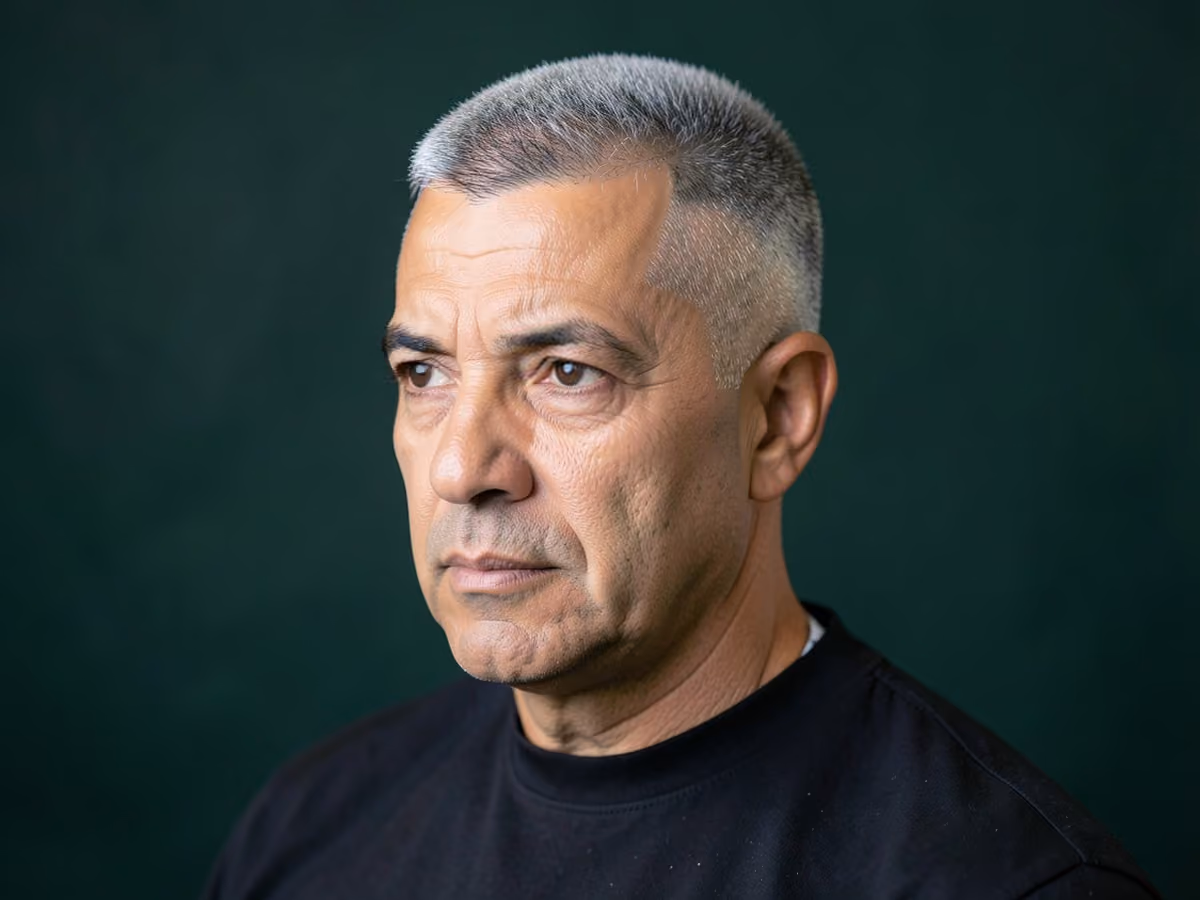 Man with a razor fade with line up
