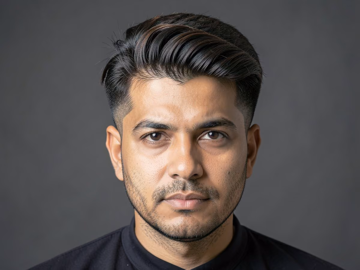 Man with a retro feathered cut with fade
