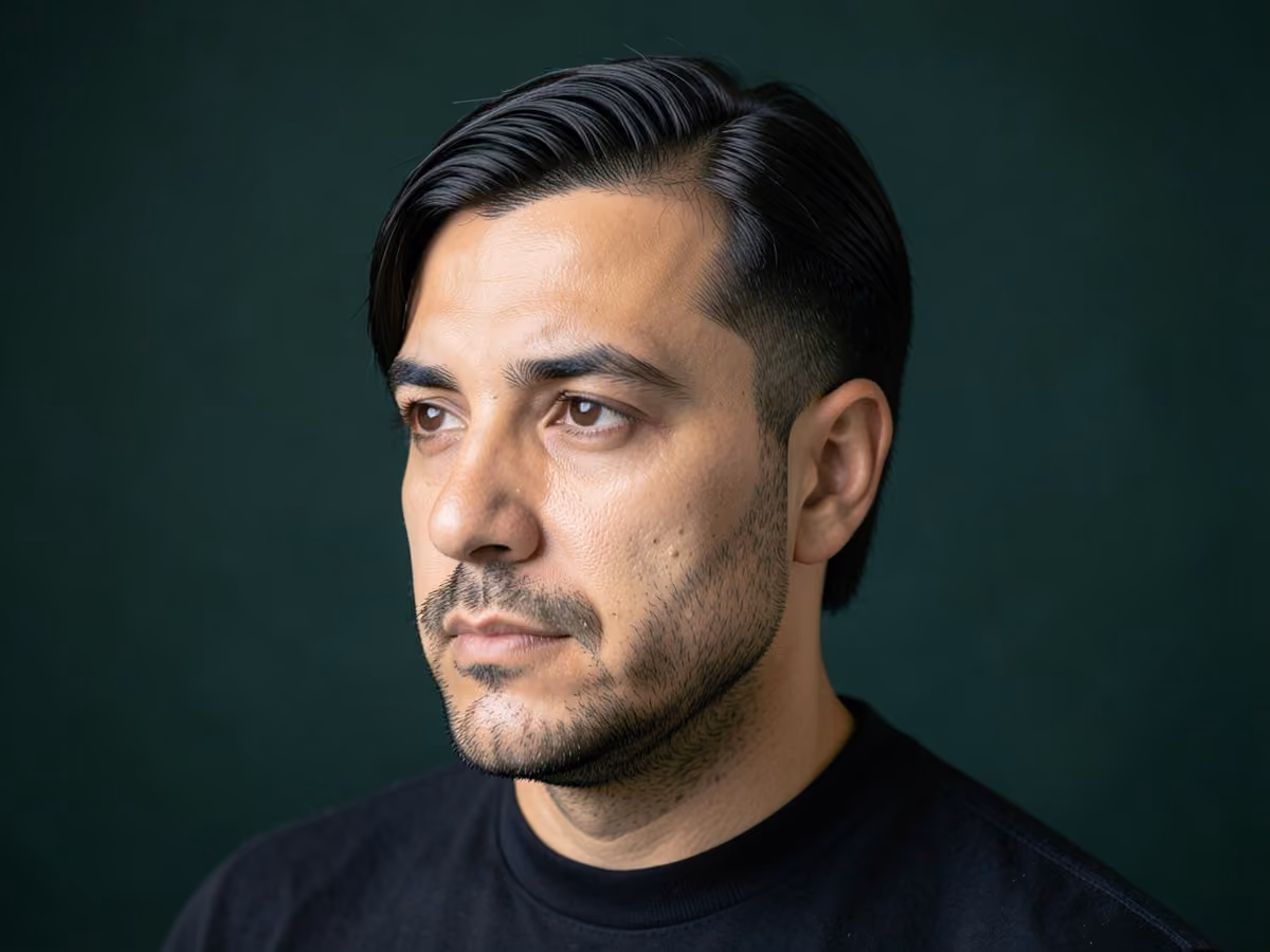 Man with a disconnected long top