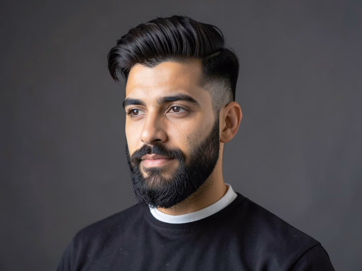 Man with a long quiff with short sides