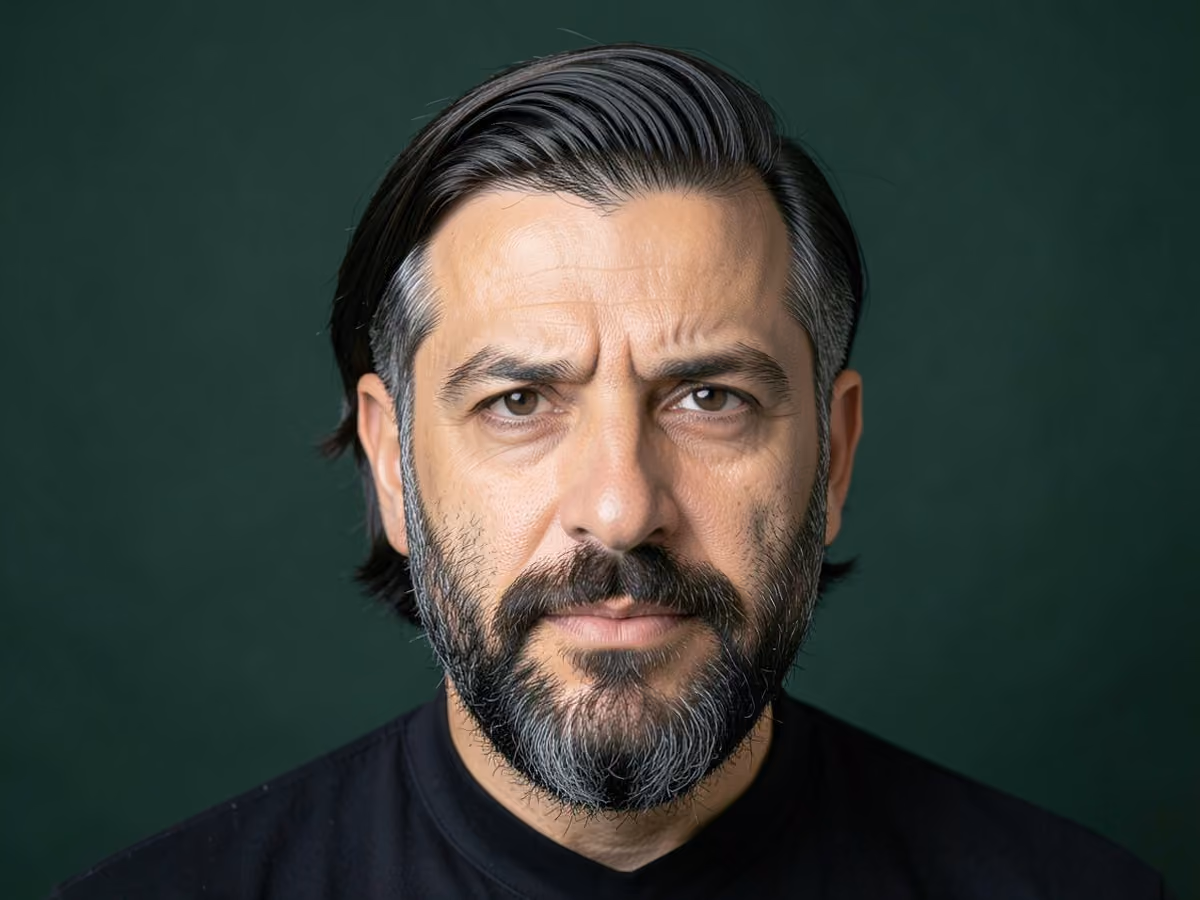 Man with a long top comb over