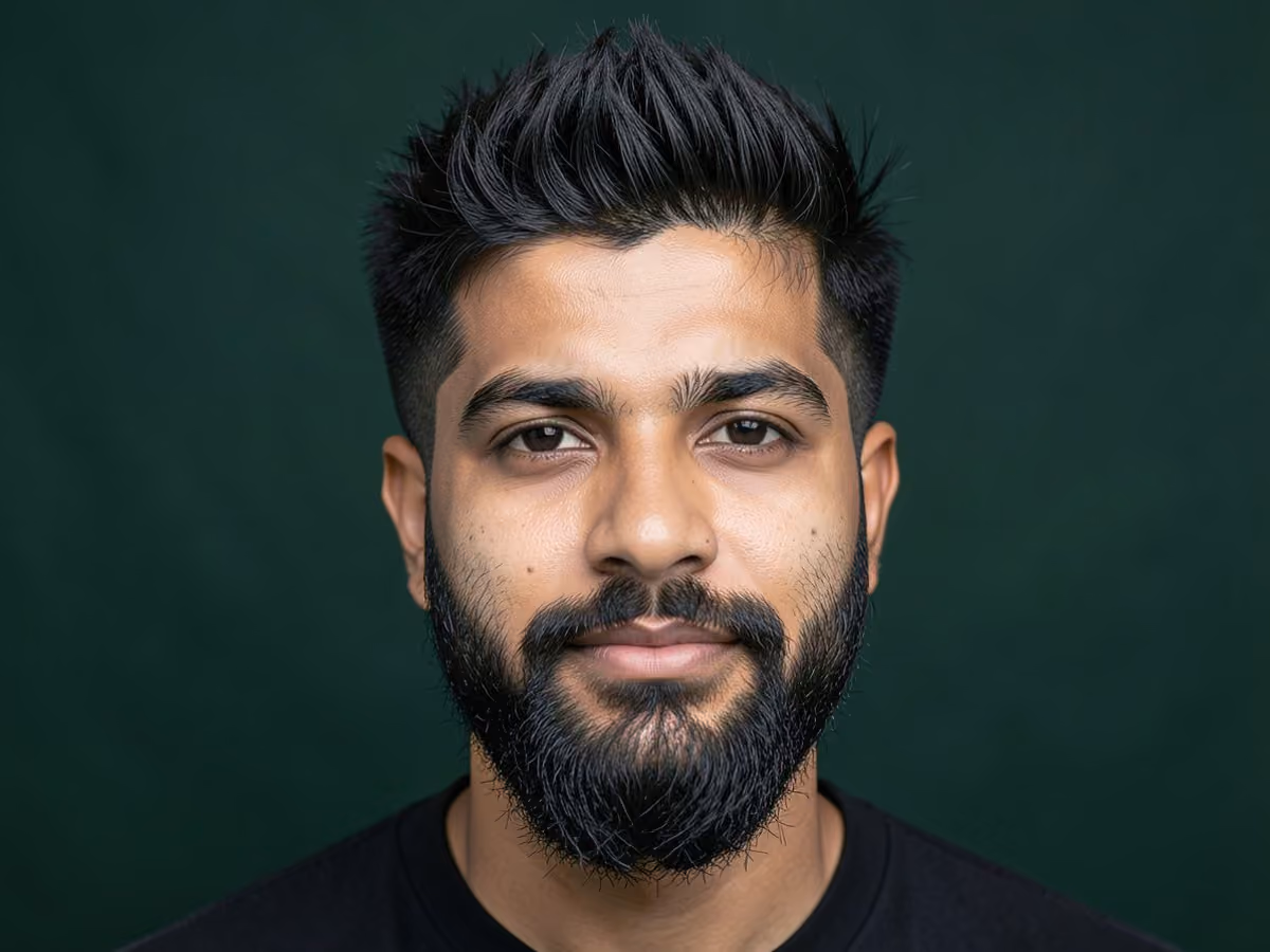 Man with a wolf cut with faded sides