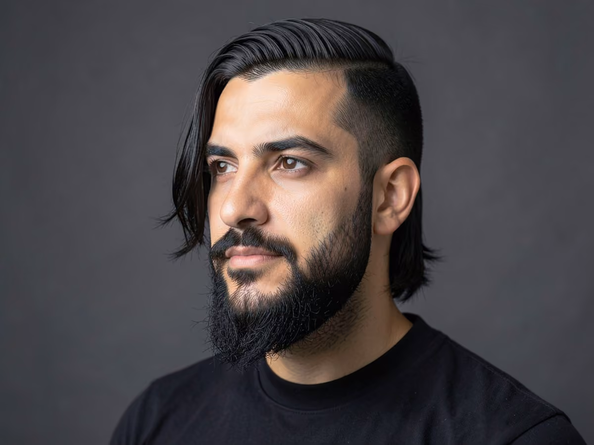 Man with a sideburns with long hair