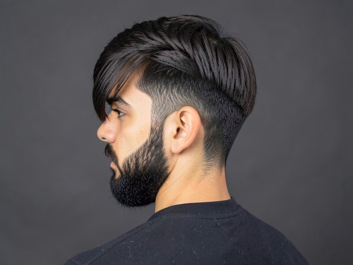 Man with a side swept skater fringe haircut