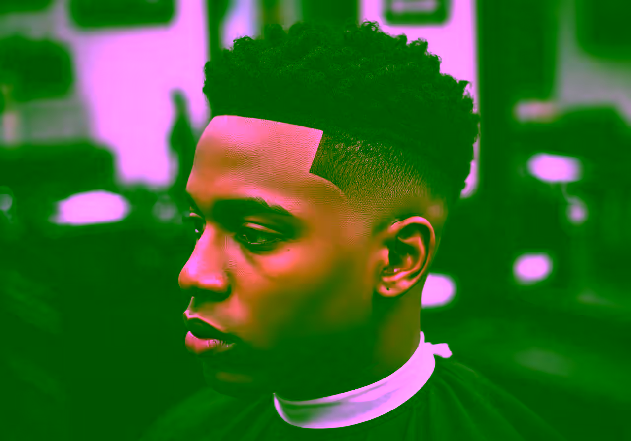 Skin Fade Black Male hairstyle for men 2026 — skin fade variation, best for oval, square faces + curly/coily hair, modern barbering by Master Stylist Jessica Hamilton