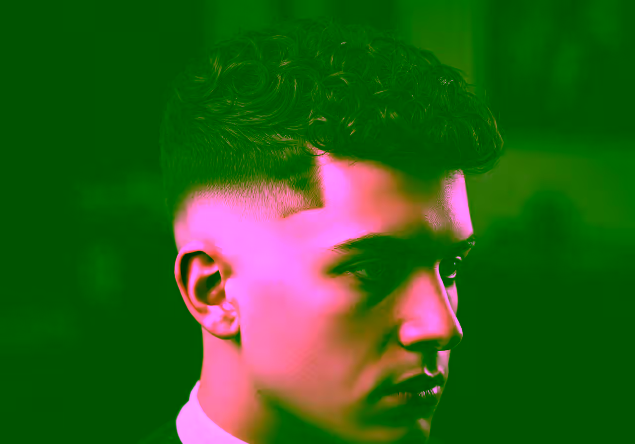 Skin Fade Curly Hair hairstyle for men 2026 — skin fade variation, best for oval, round, diamond faces + curly/coily hair, modern barbering by Master Stylist Jessica Hamilton