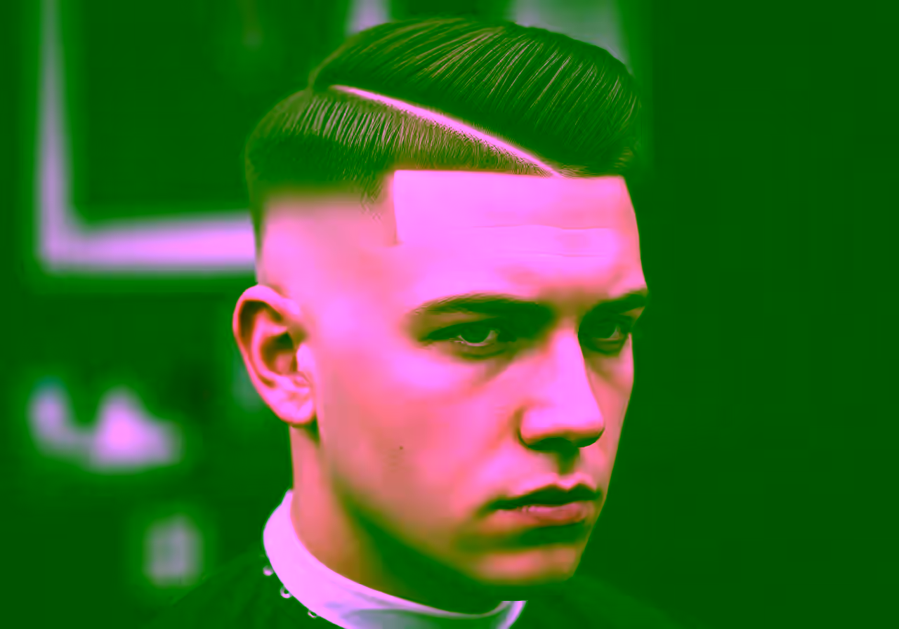 Skin Fade Hard Part hairstyle for men 2026 — skin fade variation, best for professional-bold looks + straight hair, modern barbering by Master Stylist Jessica Hamilton