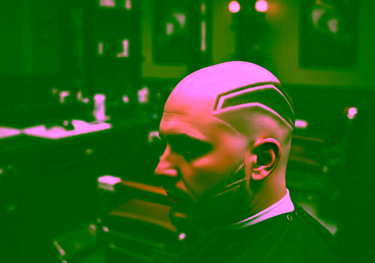 Skin Fade with Line Design hairstyle for men 2026 — skin fade variation, best for creative men + all faces, modern barbering by Master Stylist Jessica Hamilton