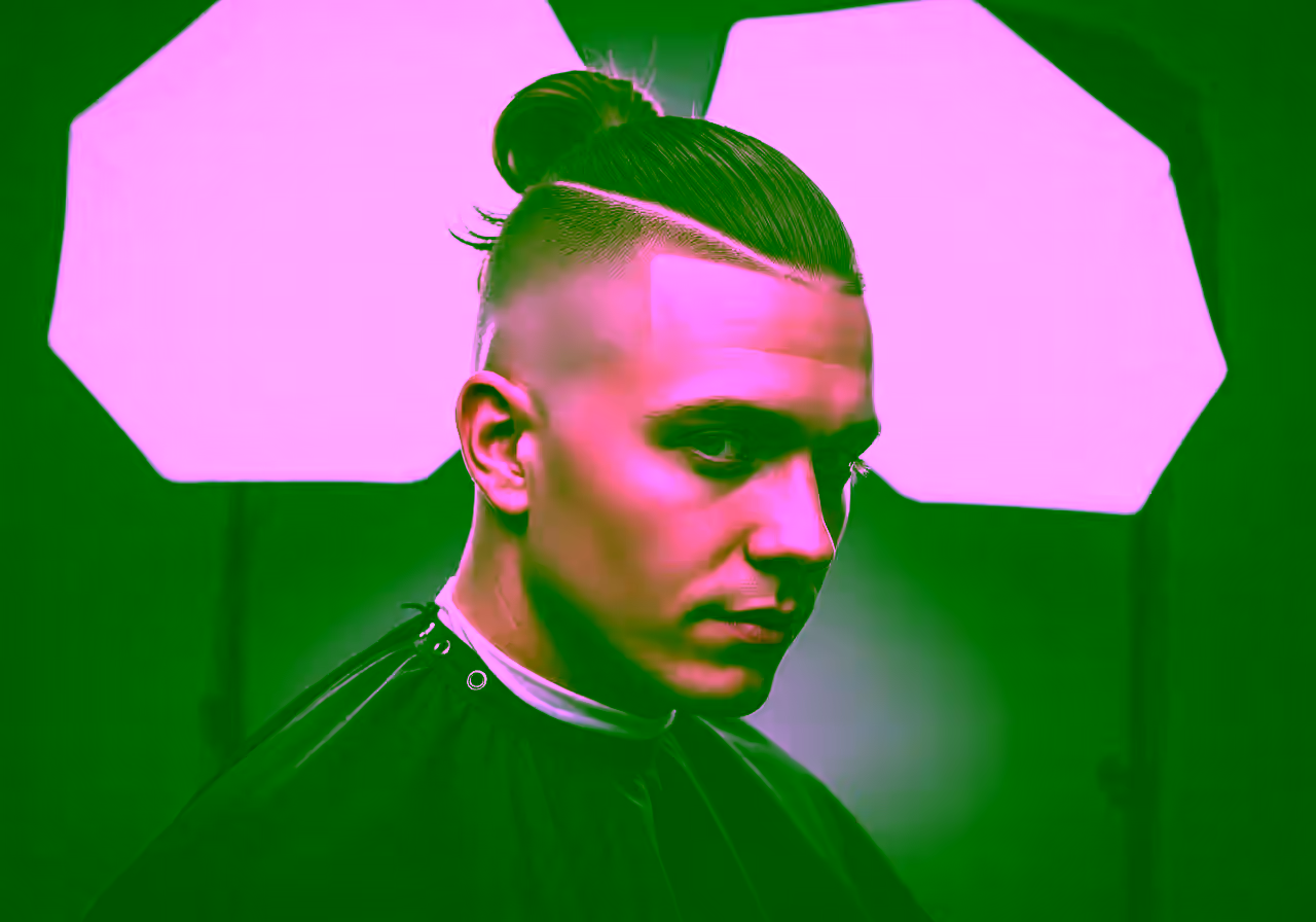Skin Fade Man Bun hairstyle for men 2026 — skin fade variation, best for relaxed cool style + all faces, modern barbering by Master Stylist Jessica Hamilton